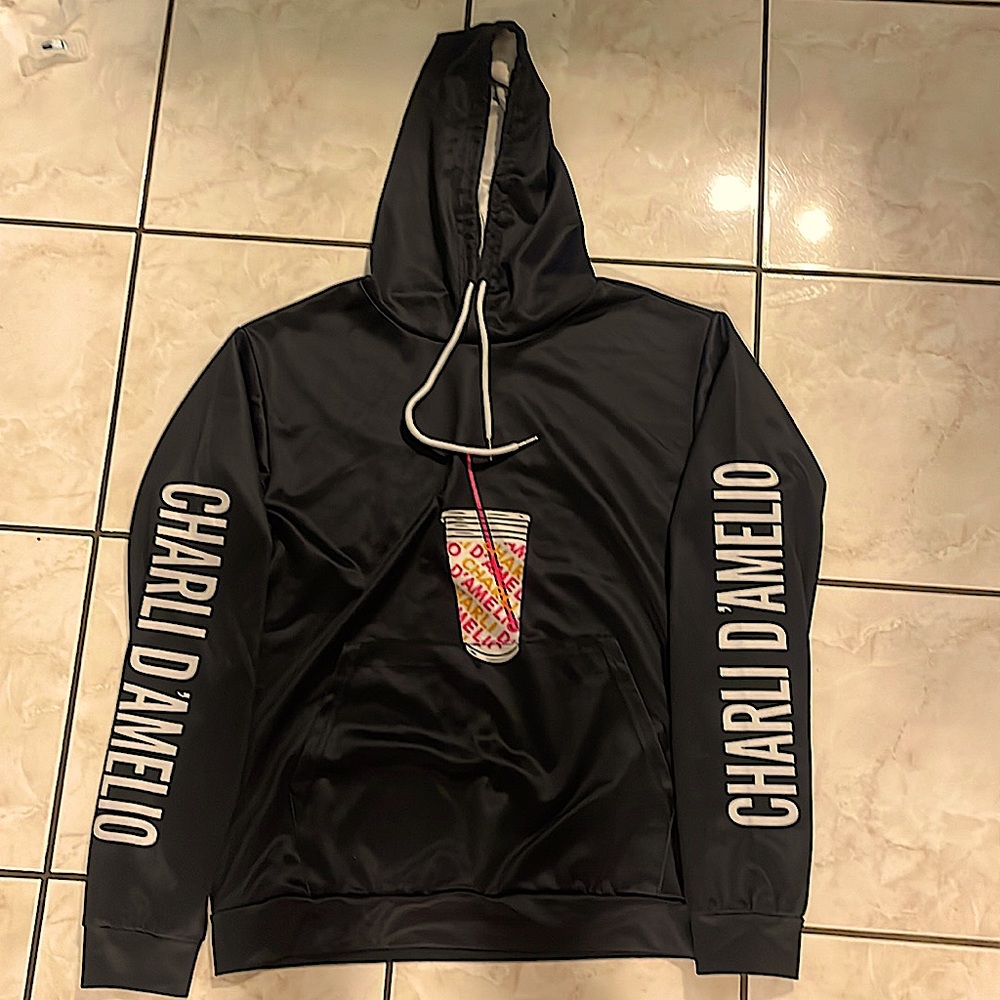 Charli d’amelio sweater with hoddie and poket. Size adult xs